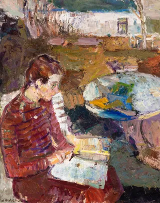 Sittende menneske i hage