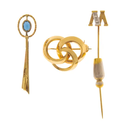 Slipsnål og to brosjer