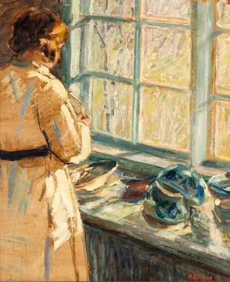 Pike ved kjøkkenvindu